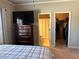 View of primary bedroom with ensuite bath and walk-in closet at 187 Slate Dr, Buford, GA 30518