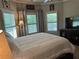 Bright bedroom featuring comfortable bedding and great natural light at 187 Slate Dr, Buford, GA 30518