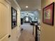 Hallway leading to bonus room, perfect for entertaining, complete with multiple seating areas at 187 Slate Dr, Buford, GA 30518