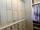 Spacious closet featuring built-in cabinets and shelving, offering ample storage solutions for a clutter-free wardrobe at 187 Slate Dr, Buford, GA 30518