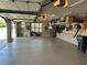 Well-organized garage with ample storage, epoxy flooring and convenient overhead lighting at 187 Slate Dr, Buford, GA 30518