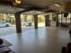 Spacious garage with multiple bays, epoxy flooring and ample parking space for vehicles at 187 Slate Dr, Buford, GA 30518