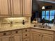 Kitchen area offers granite countertops, stainless appliances, and seamlessly connects to the home's living spaces at 187 Slate Dr, Buford, GA 30518