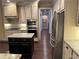 Well-equipped kitchen featuring granite countertops, stainless steel appliances, and a convenient center island at 187 Slate Dr, Buford, GA 30518