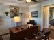 Comfortable office space with wood-paneled walls, large desk and classic decor at 187 Slate Dr, Buford, GA 30518