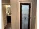 Pantry door with frosted glass provides a decorative touch in the home at 187 Slate Dr, Buford, GA 30518