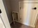 View of a storage area with door and ample shelving at 187 Slate Dr, Buford, GA 30518