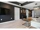 Contemporary living room with a large TV, modern furniture, and stylish decor at 195 14Th St # 1403, Atlanta, GA 30309
