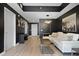 Open living area featuring a white couch, modern lighting, and contemporary artwork at 195 14Th St # 1403, Atlanta, GA 30309