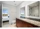 Elegant bathroom with a granite countertop vanity, modern fixtures, and a view from the doorway at 250 Pharr Ne Rd # 1113, Atlanta, GA 30305