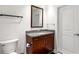 Comfortable bathroom featuring granite vanity, a toilet, and a chrome towel bar at 250 Pharr Ne Rd # 1113, Atlanta, GA 30305