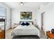 Sun-filled bedroom featuring a minimalist design, complete with a king-size bed and modern decor at 250 Pharr Ne Rd # 1113, Atlanta, GA 30305