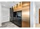Sleek kitchen design with black and gold cabinets, and stainless-steel appliances at 250 Pharr Ne Rd # 1113, Atlanta, GA 30305