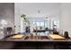 Modern kitchen with a center island, stone countertops, copper faucet, and modern backsplash at 250 Pharr Ne Rd # 1113, Atlanta, GA 30305