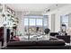 Bright living room with access to private balcony and views of the city at 250 Pharr Ne Rd # 1113, Atlanta, GA 30305