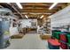 Basement featuring tiled floors and an open space with organized storage and a workbench at 4095 Fastnet Ln, Duluth, GA 30096