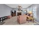 Spacious living room with a brick fireplace and large windows at 4095 Fastnet Ln, Duluth, GA 30096