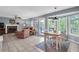 Open concept living room with dining area and access to the back deck at 4095 Fastnet Ln, Duluth, GA 30096