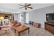Comfortable living room adjacent to kitchen with cozy furniture at 4095 Fastnet Ln, Duluth, GA 30096