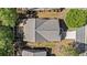 A bird's eye view of the home showing its architectural design, the well-kept landscaping, and its position within the neighborhood at 4930 Kings Common Way, Cumming, GA 30040