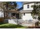 A delightful backyard features a deck with a pergola, a built-in BBQ station, and a manicured lawn perfect for outdoor enjoyment at 1205 Club Walk Ne Dr, Brookhaven, GA 30319