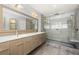 Modern bathroom with double vanity and large walk-in shower at 1205 Club Walk Ne Dr, Brookhaven, GA 30319