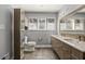 Updated bathroom with double vanity, modern fixtures, and plenty of light at 1205 Club Walk Ne Dr, Brookhaven, GA 30319