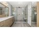 Bathroom boasts glass shower with dual shower heads and a built-in bench at 1205 Club Walk Ne Dr, Brookhaven, GA 30319