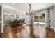 Open kitchen and dining area with stainless steel appliances, island seating, and sliding doors to the deck at 1205 Club Walk Ne Dr, Brookhaven, GA 30319