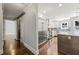 Bright kitchen features stainless appliances, white cabinets, and hardwood floors at 1205 Club Walk Ne Dr, Brookhaven, GA 30319