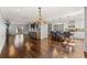 Open concept living space featuring a kitchen island with seating and a connected living room at 1205 Club Walk Ne Dr, Brookhaven, GA 30319