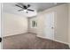 Bedroom with neutral carpet, and a ceiling fan at 1217 Topaz Ln, Villa Rica, GA 30180