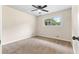 Bedroom with neutral carpet, and a ceiling fan at 1217 Topaz Ln, Villa Rica, GA 30180