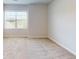 Bright and airy bedroom with neutral carpeting and natural light from two windows at 1673 Dover Creek Ln, Lawrenceville, GA 30045