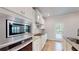 Contemporary kitchen with stainless steel appliances, granite countertops, and ample cabinet space at 1673 Dover Creek Ln, Lawrenceville, GA 30045