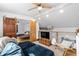 Upstairs living room features barn door access to bedroom, comfy seating, and lots of natural light at 1952 Don Juan Ln, Decatur, GA 30032