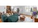 Sun-filled living room features a comfortable green sofa, open floor plan, and natural light at 1952 Don Juan Ln, Decatur, GA 30032