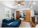 Cozy loft area with comfortable seating, barn door entry to bedroom, and natural light, creating a relaxing space at 1952 Don Juan Ln, Decatur, GA 30032