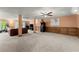 Spacious finished basement boasts neutral carpet, drop ceiling, and plenty of room for entertainment and activities at 440 Hunt River Way, Suwanee, GA 30024
