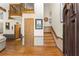 Welcoming foyer features hardwood floors and stairs leading to the second floor at 440 Hunt River Way, Suwanee, GA 30024