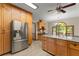 Bright kitchen with stainless steel appliances and breakfast nook at 440 Hunt River Way, Suwanee, GA 30024
