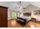 Large main bedroom with vaulted ceilings, a ceiling fan, and many windows at 440 Hunt River Way, Suwanee, GA 30024