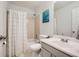 Bathroom featuring single sink vanity, toilet and shower/tub combo at 1206 Parkwood Chase, Acworth, GA 30102