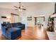 Living room view showcasing hardwood floors, fireplace and an open concept design that connects to the dining area at 1206 Parkwood Chase, Acworth, GA 30102