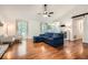 Bright living room with hardwood floors, fireplace, large windows, and vaulted ceilings at 1206 Parkwood Chase, Acworth, GA 30102
