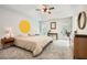 Spacious main bedroom featuring neutral colors, carpet flooring and a ceiling fan at 1206 Parkwood Chase, Acworth, GA 30102