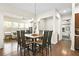 Dining area featuring hardwood floors, decorative lighting and large windows at 1318 Crestwind Nw Rd, Kennesaw, GA 30152