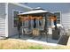 Backyard gazebo with outdoor seating, a table, and a grill at 1318 Crestwind Nw Rd, Kennesaw, GA 30152