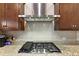 Kitchen featuring stainless steel range and granite countertops at 1318 Crestwind Nw Rd, Kennesaw, GA 30152