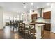 Open kitchen featuring a spacious island, stainless steel appliances, and a modern design at 1318 Crestwind Nw Rd, Kennesaw, GA 30152
